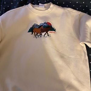 Stay cool NYC “mountain” crewneck sweater.